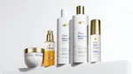 Năm sản phẩm thuộc dòng Dove Damage Therapy, được thiết kế để phục hồi và tăng cường cho tóc hư tổn. Bao bì màu trắng với điểm nhấn màu vàng.
