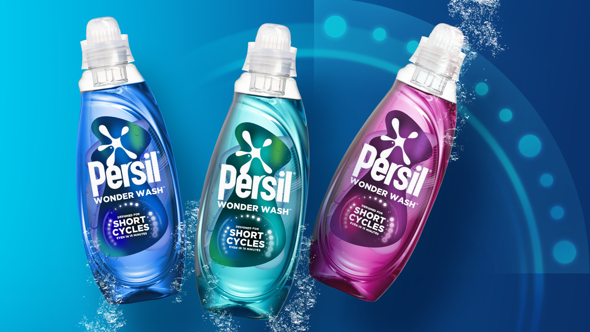 Một chai Persil Wonder Wash màu xanh dương, xanh ngọc và hồng trên nền màu xanh teal.